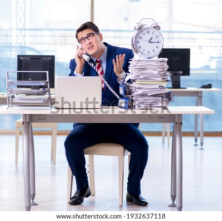 Stok fotoğraf: Businessman Employee In Urgency And Deadline Concept With Alarm