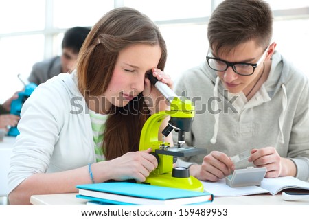 Stock foto: High School Students Beautiful Girl Relaxing At Biology Classro