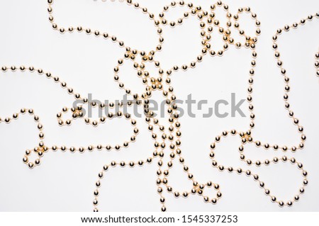 Zdjęcia stock: Background Made Of A Brilliant Celebratory Beads Of Golden Color