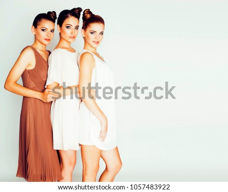 Foto stock: Tree Pretty Stylish Young Woman With Same Hairstyle And Makeup Best Friend Together Having Fun Lif