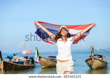 Foto stock: Happy Woman Having Fun At The Beach With Thailand Flag Beautiful Girl Enjoying Travel To Asia Banne