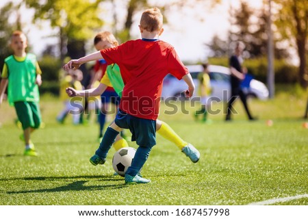 Boys Playing Football Stockfoto © matimix