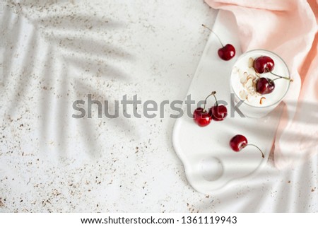 Stock fotó: Fresh Cherry Yogurt With Oats And Chia Seeds Delicious Dessert For Healthy Breakfast