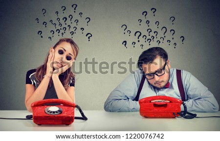 Stock foto: Sad Man And Woman Waiting For A Phone Call From Each Other Have Many Questions