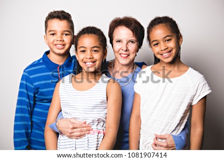 Stock fotó: Black Twin Girls And Boy Child With Grandmother In Studio White Background