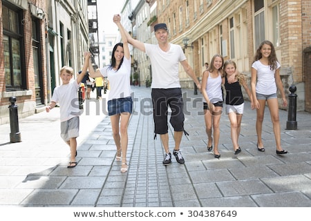 Foto stock: Summer Family Portrait Of Parents And Kids Outside In Urban Style