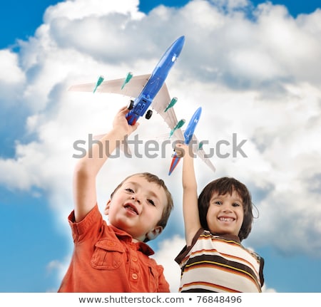 Stok fotoğraf: Two Boys With Airplains In Hands