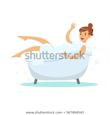 Stok fotoğraf: Smiling Woman Enjoying A Foamy Bubble Bath