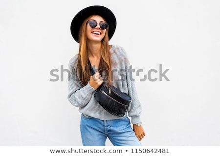 [[stock_photo]]: Elegant Young Woman Posing With A Hat