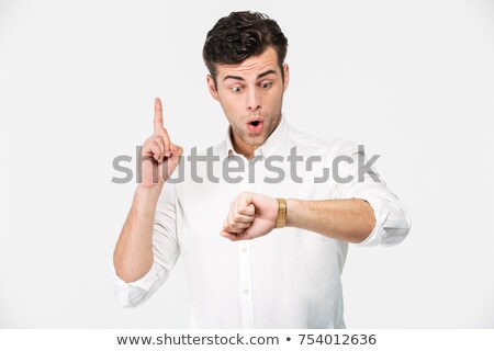 Stock fotó: Man Pointing To His Watch
