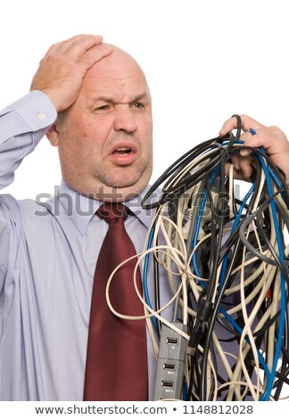 Stock photo: Man Tangled In Cable