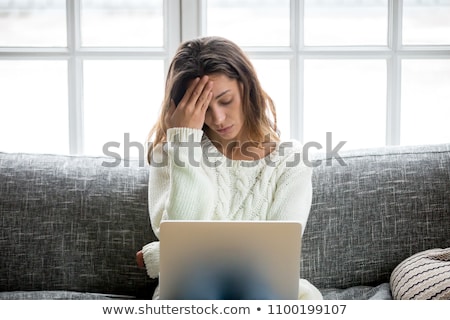 Foto d'archivio: Student Looking Upset In Computer Room