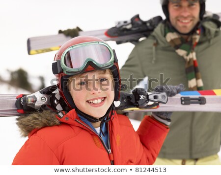 Stock photo: Pre Teen Boy With Father On Ski Vacation