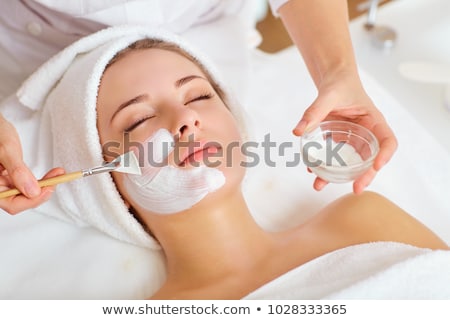 Stock photo: Facial Treatment Women With Facial Mask