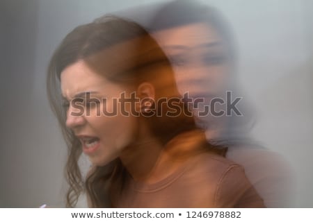 Stockfoto: Worried Woman Double Exposure