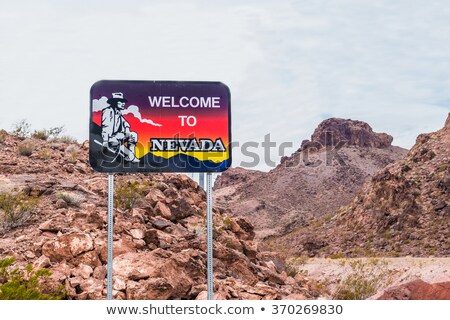 [[stock_photo]]: Welcome To Nevada - Road Stand