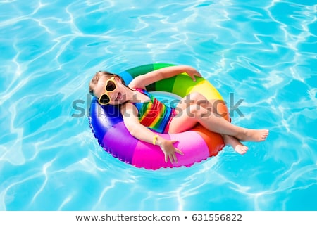 Stock photo: Little Girl Playing On The Beach