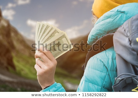 Zdjęcia stock: Hand Holding A Fan Of Dollars One Hundred Dollars Banknotes Bundle Lot Dollars Lot Of Banknotes