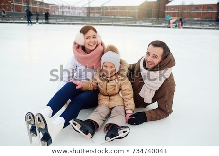 Foto d'archivio: Little Girl Enjoying Ice Skating In Winter Season