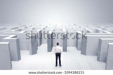 [[stock_photo]]: Businessman Choosing Between Entrances In A Middle Of A Dark Maze