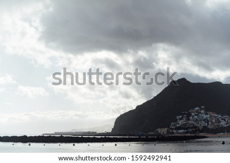 Stock photo: View From The Height Of The Golden Sand Palm Trees Sun Loungers Cloudy Weather