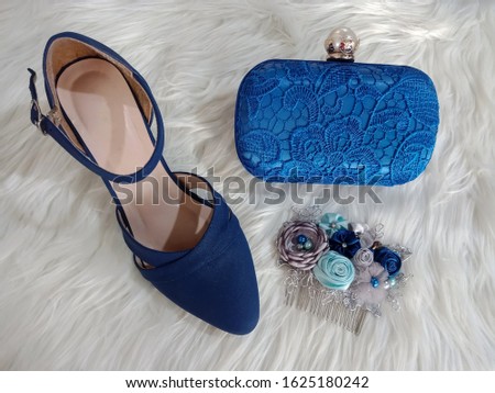 ストックフォト: Beautiful Blue Shoes With Clutches On White Isolated Background