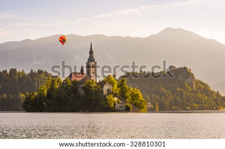 Stock fotó: Catholic Church In Bled Lake Slovenia With Hot Air Balloon Flyi