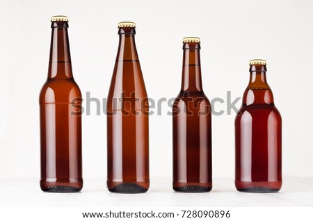 Stock photo: Brown Longneck Beer Bottle 500ml With Blank White Label On White Wooden Board Mock Up