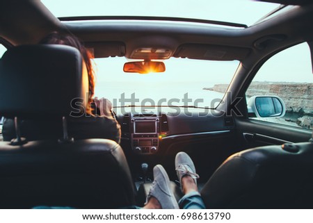 Foto d'archivio: Spending Weekend In Roadtrip Car Vacation Concept Woman Shoes O