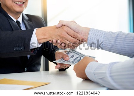 Stockfoto: Businessman Or Politician Taking Bribe And Shaking Hands With Mo