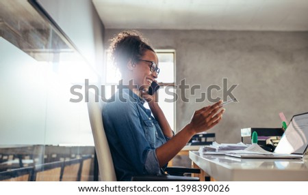 Stockfoto: Young Startup Business Professional Talking To A Client On His C