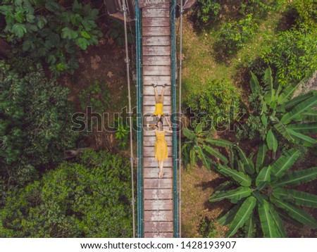 Stok fotoğraf: Mom And Son Tourists At Capilano Suspension Bridge Kuala Lumpur Forest Eco Park Areial View Traveli