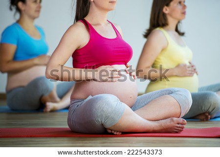 [[stock_photo]]: Portrait Of Happy Beautiful Pregnant Woman Doing Physical Exerci