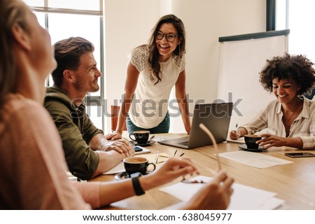 Stockfoto: Happy Smiling Business Professional Woman Explaining Something W