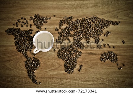 Foto stock: Dramatic Photo Of World Map Made Of Coffee Beans White Cup With