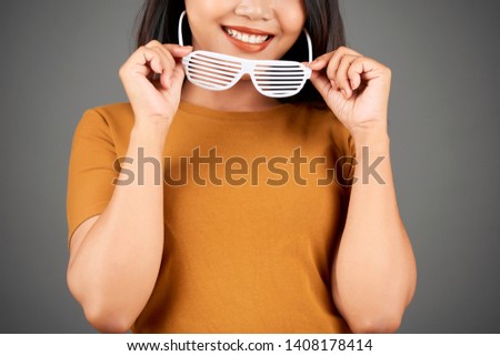 Stok fotoğraf: Beautiful Young Woman With Stylish Shutter Shades Sunglasses Iso