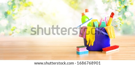 Stockfoto: Basket With Cleaning Items On Blurry Background White Citchen C