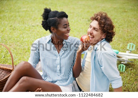 Stock photo: Chilling Content Diverse Couple On Picnic