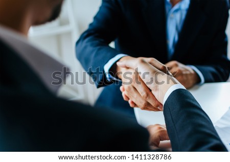 Foto stock: Business Handshake After Agreement Meeting Or Negotiation Finish