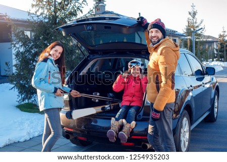 Stock photo: Young Woman With Ski Equipment Spending Winter Vacation At Mount