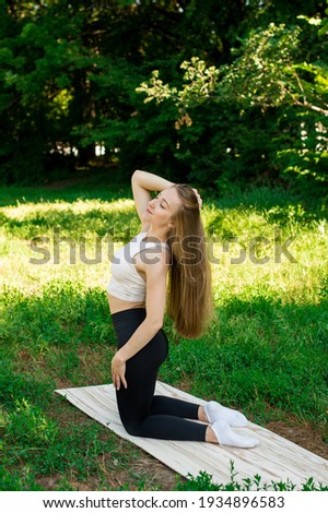 [[stock_photo]]: Aerobics Spinning Woman Stretching Exercises After Workout