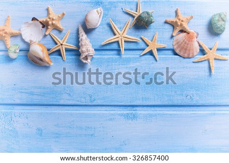 Foto d'archivio: Sea Frame Different Marine Items On Blue Wooden Background Sea