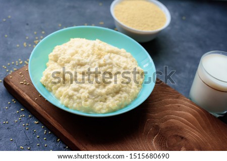 Stockfoto: Millet In Wooden Bowl And Spoon Groats In Wood Dish And Shovel