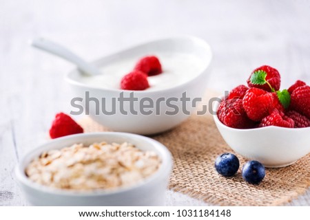 Stok fotoğraf: Fresh Raw Organic Berries Isolated In White Ceramic Bowl Plate On Kitchen Table Background Space Fo