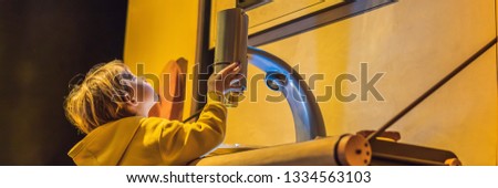 Foto stock: Boy In Science Class With Electron Microscope Banner Long Format