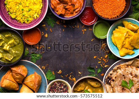 Stok fotoğraf: Assorted Indian Food On Dark Wooden Background Dishes And Appetizers Of Indian Cuisine Curry Butt