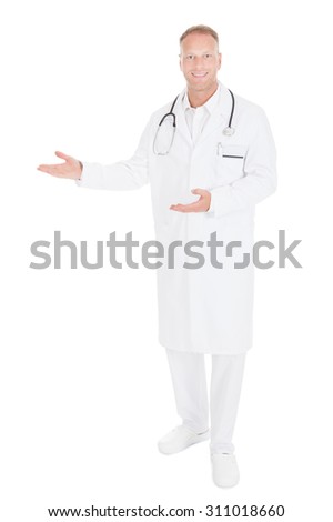 Сток-фото: Full Length Portrait Of A Happy Male Doctor Standing Over White Background