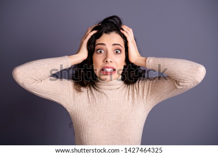 Foto stock: Portrait Of Beautiful Desperate Scared Frightened Young Muslim Woman Wearing Black Hijab Holding Fol