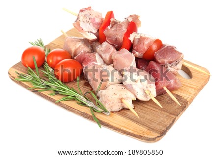 Сток-фото: Raw Pork Kebab With Paprika On Chopping Board With Fresh Vegetables And Disposable Charcoal Grill On