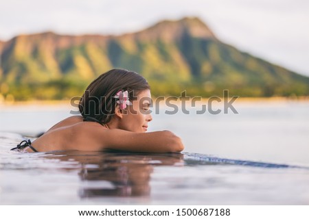 [[stock_photo]]: Tahiti Luxury Beach Bikini Asian Woman Relaxing On French Polynesia Cruise Ship Travel Bora Bora Vac